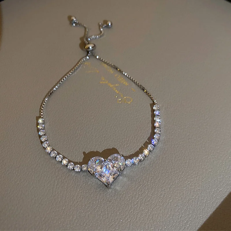 Silver-Heart-Shaped Zircon Bracelet.