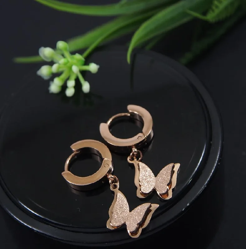 women’s twisted earrings-Tarohi Jewels Stainless Steel Rosegold Plated Butterfly Hoops Earring- STNER 4046