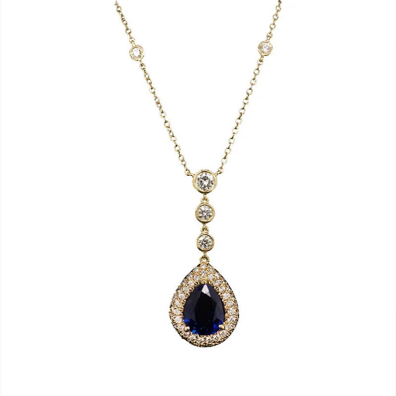 women’s elegant chain necklaces-Blue Sapphire and Diamond Halo Pendant Necklace